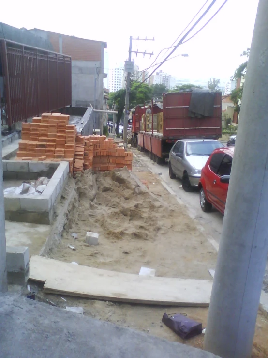 a truck is driving past a construction site