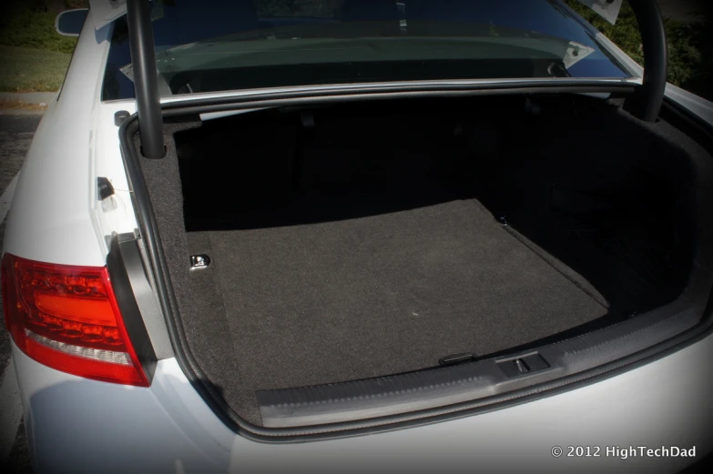 a car trunk and some seats folded