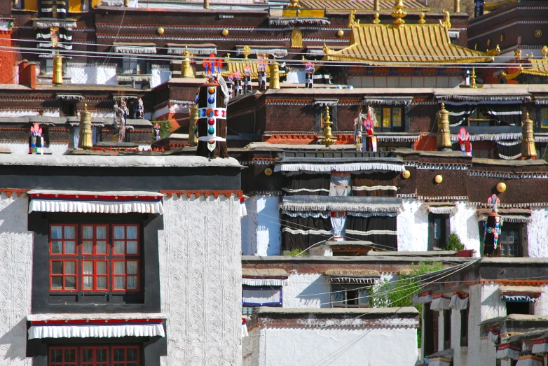 many buildings have colorful roofs and windows