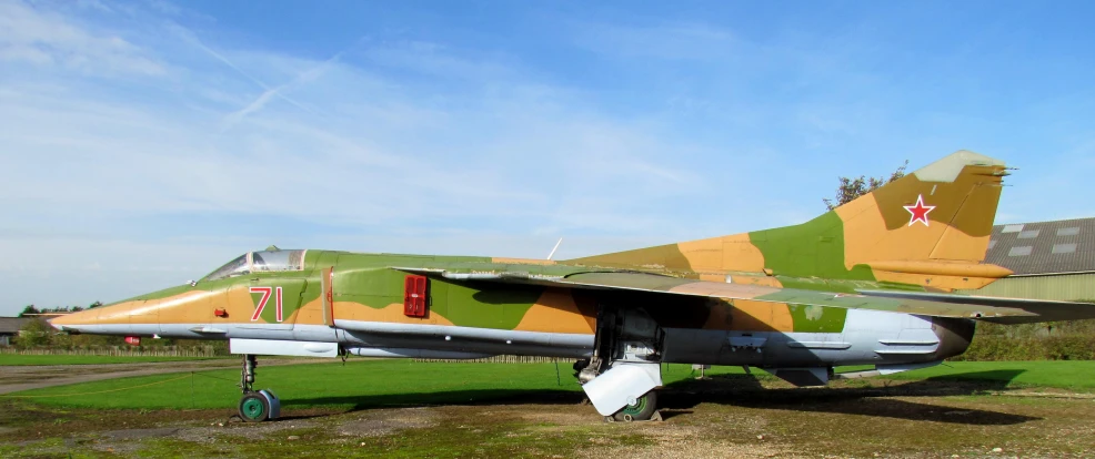 an airplane with a camouflage painted on it