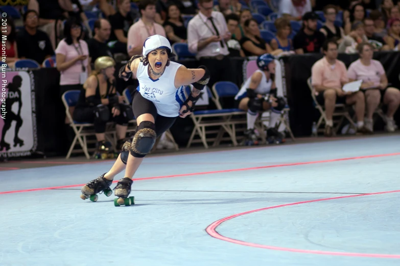 an athlete on a rollerblad skating in a competition