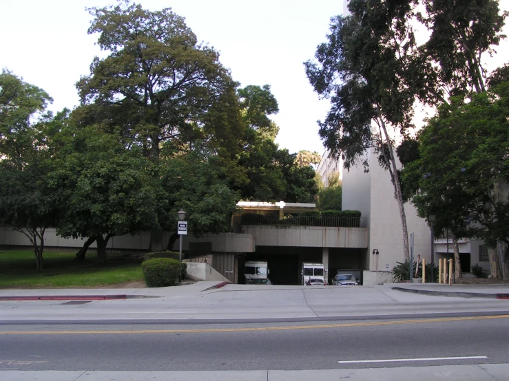 a two car garage on the side of a road