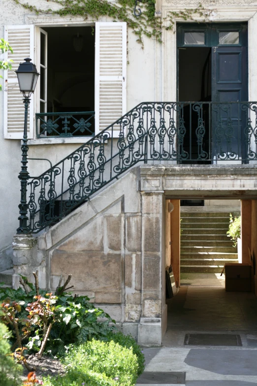 a gate that is above a building entrance