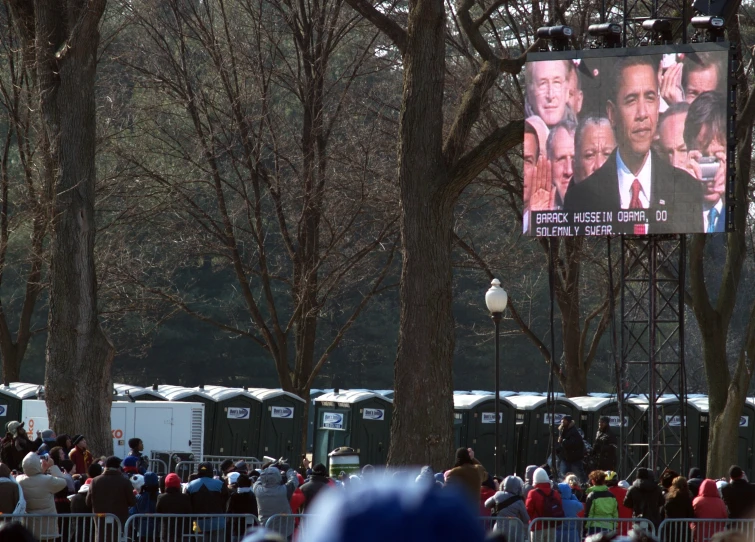 a picture is displayed on the television screen at a football game