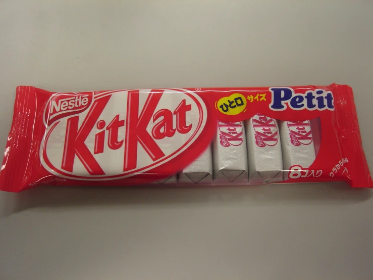 a bag of kitkat's are shown on a table