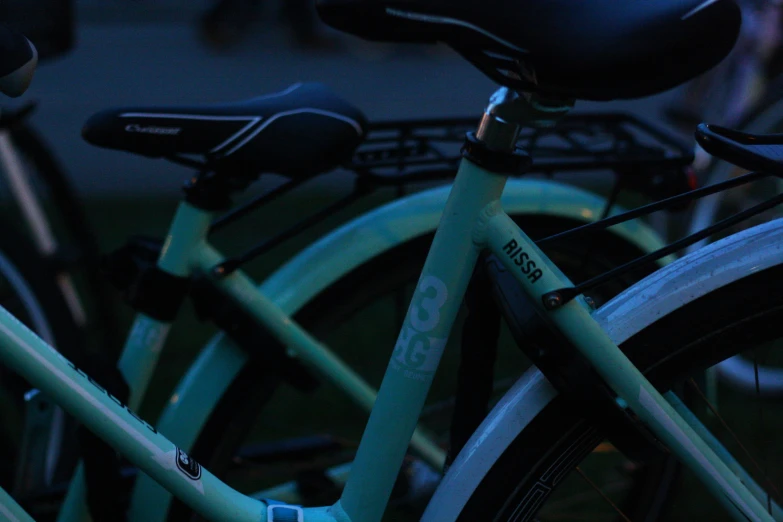 a group of bicycles parked next to each other