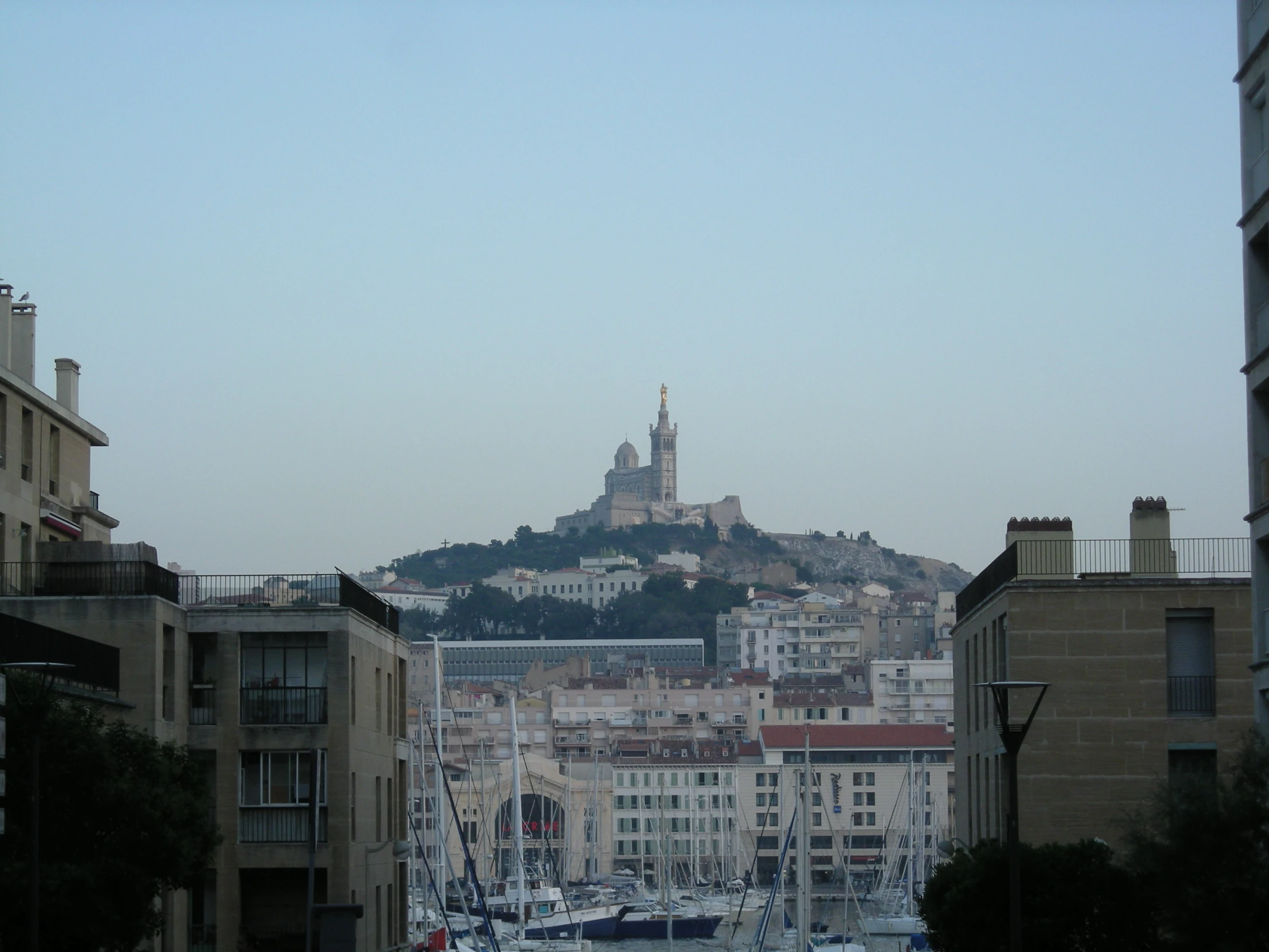 a cityscape with lots of buildings and a tower