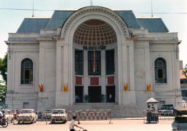 a building with an ornate arched door and window