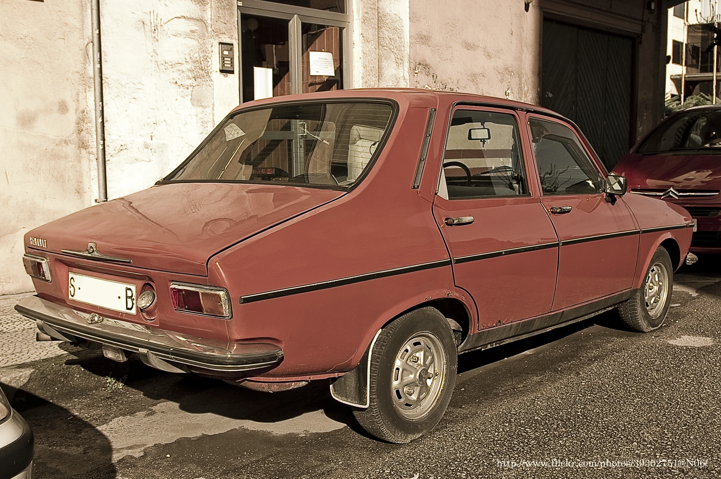 an old car is shown in a black and white po