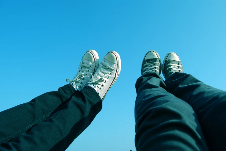 an image of a man with his feet propped up