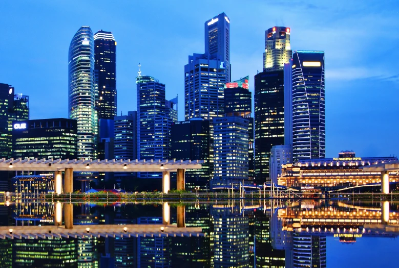 night scene of a city skyline in a downtown area