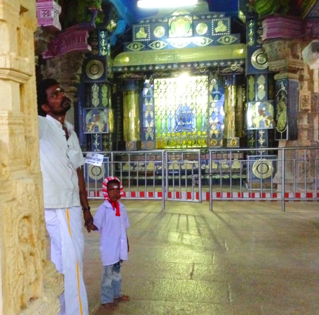 a man and child looking in the same direction