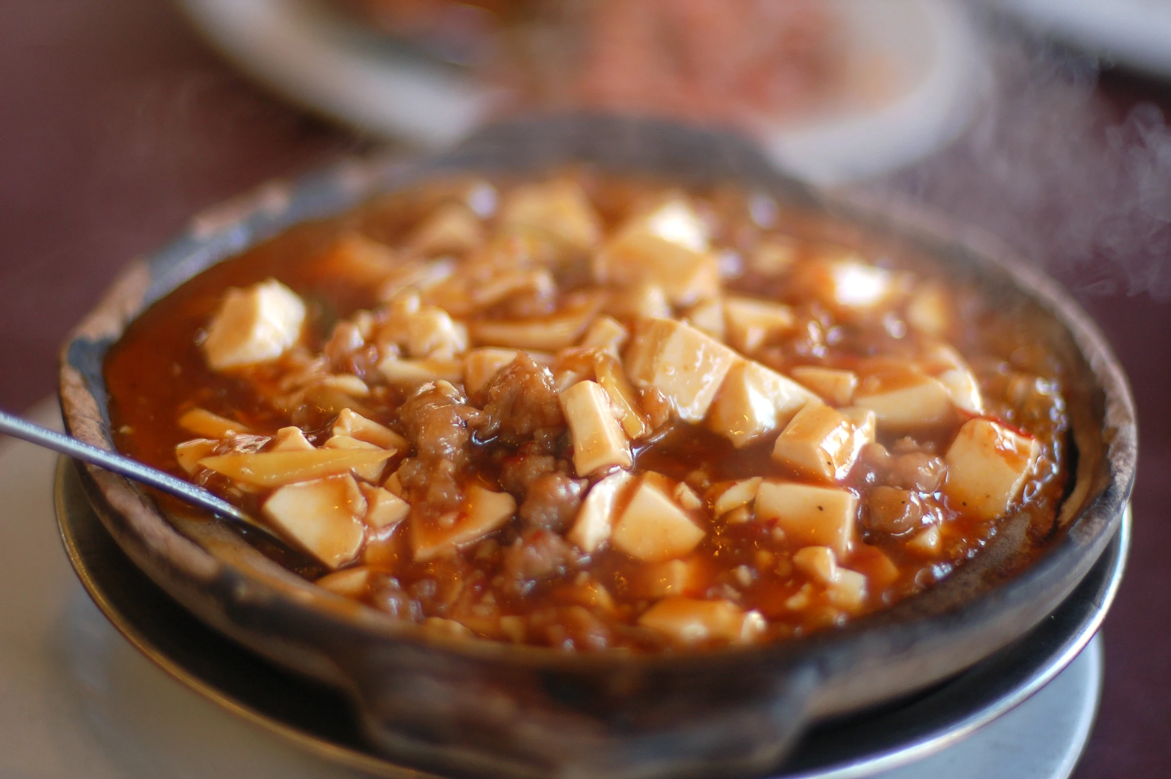 a soup is ready to be eaten and served on a plate