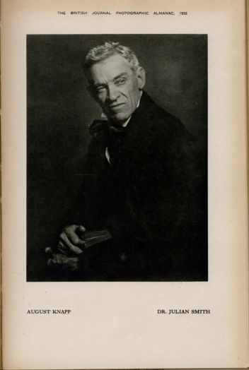 an old po of a man in black jacket