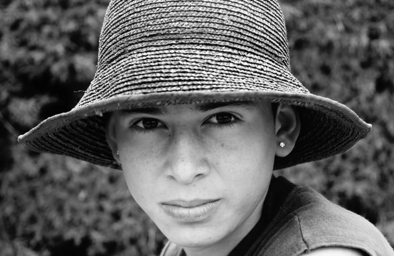 an image of a boy wearing a hat