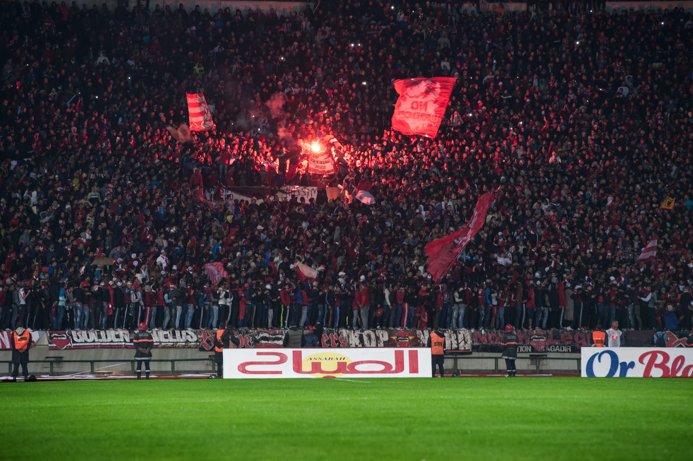 fans in the stands at a soccer game