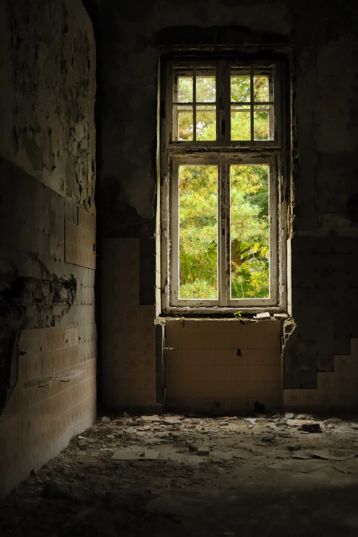 an old window on the side of a building with crumbling walls