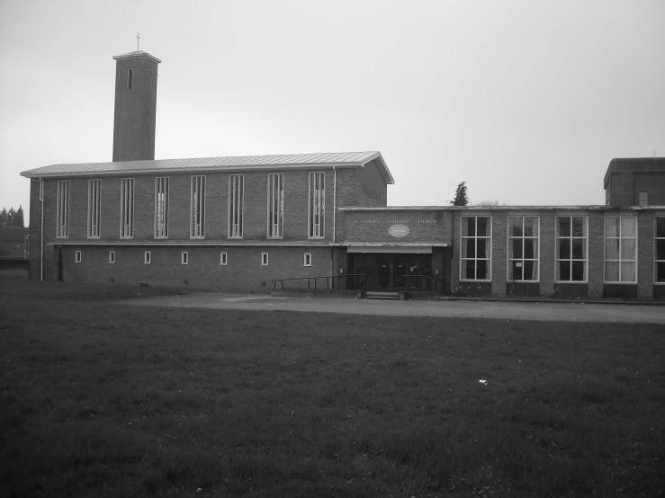 a black and white po of an old school building