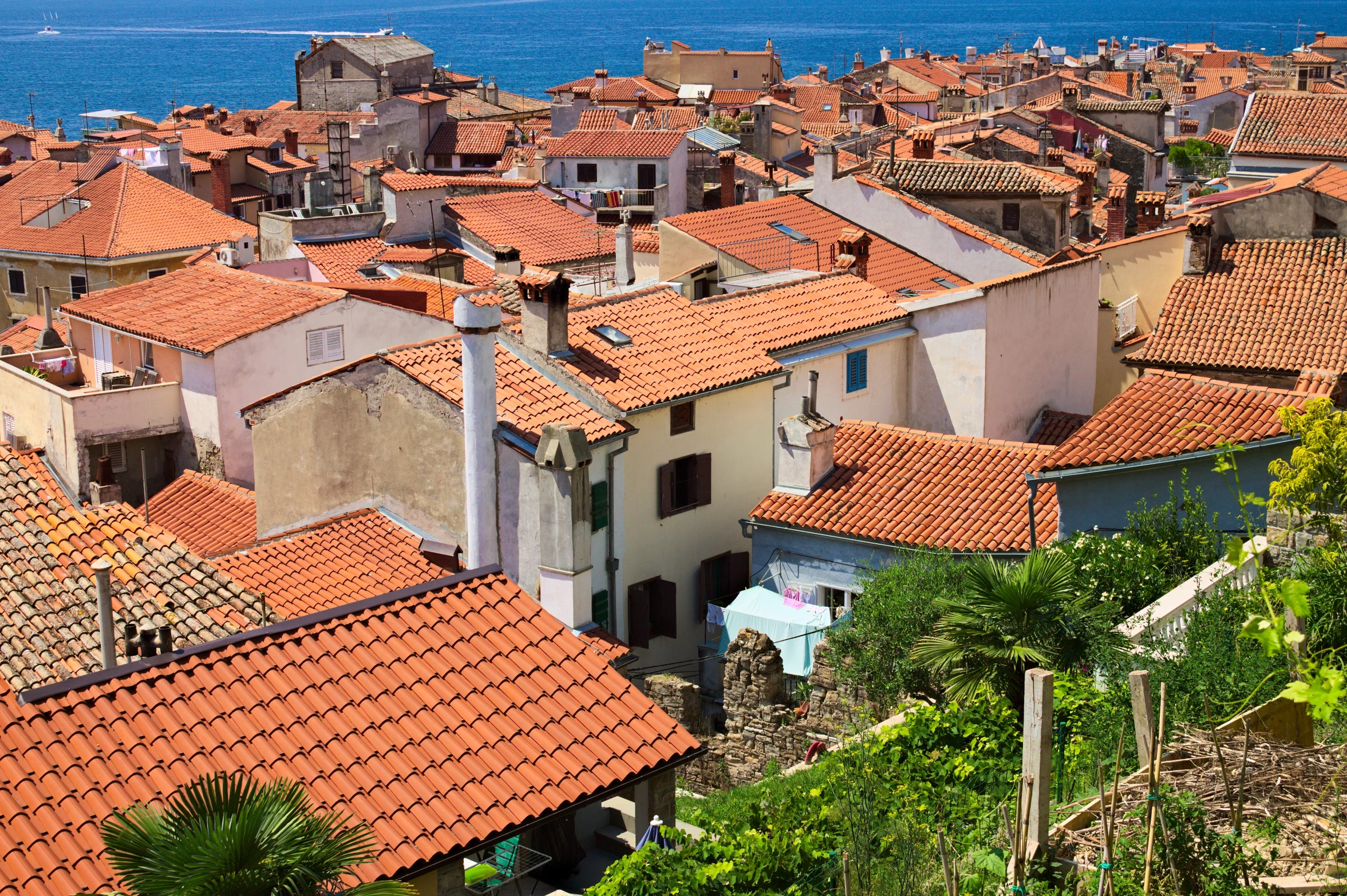 an old city and the sea are visible