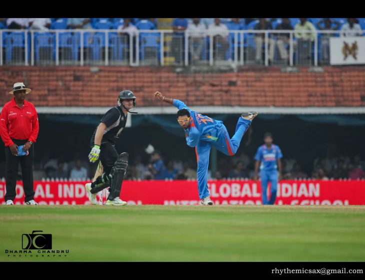 two players playing a game of cricket