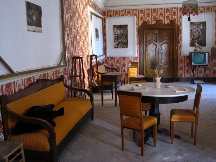 the dining room has several chairs and tables