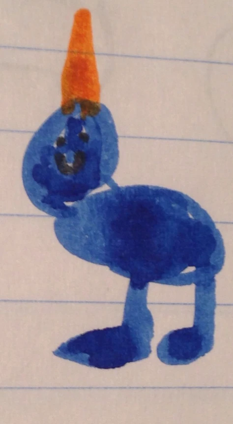 an orange cone is stuck on top of a blue bird