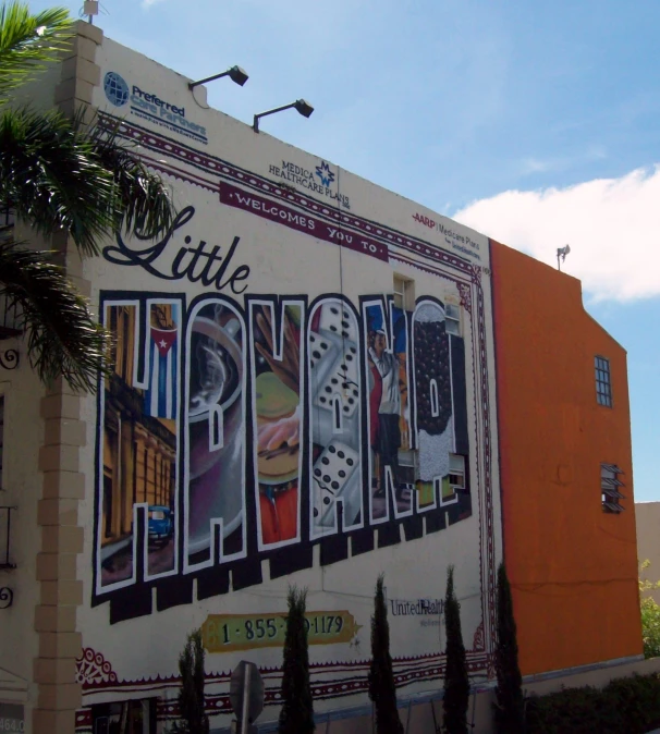 an advertising sign on the side of a building