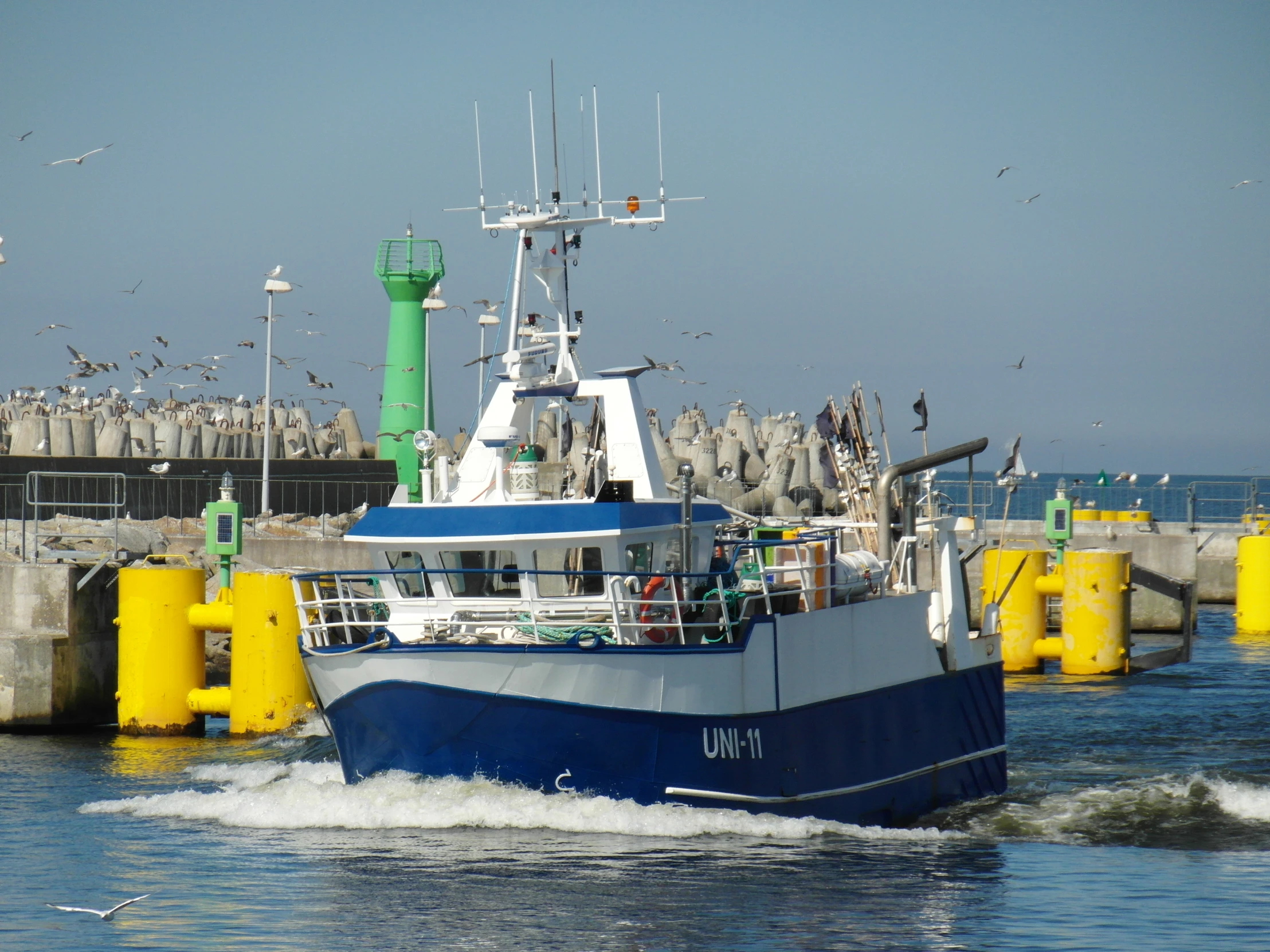 there is a boat that has passed the pier