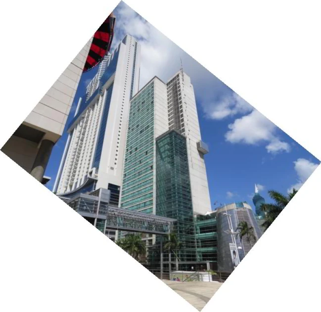 large office building in front of a blue sky