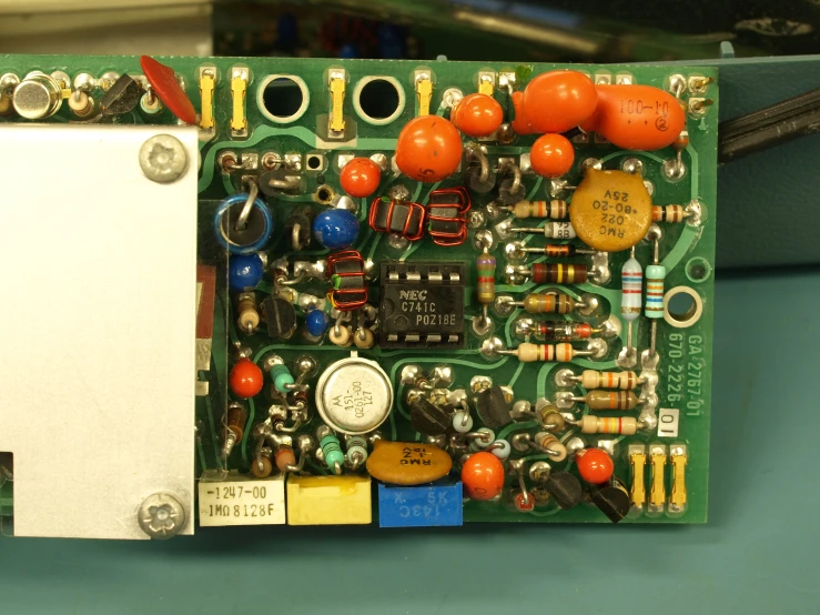 the components of a power supply board sitting on a desk