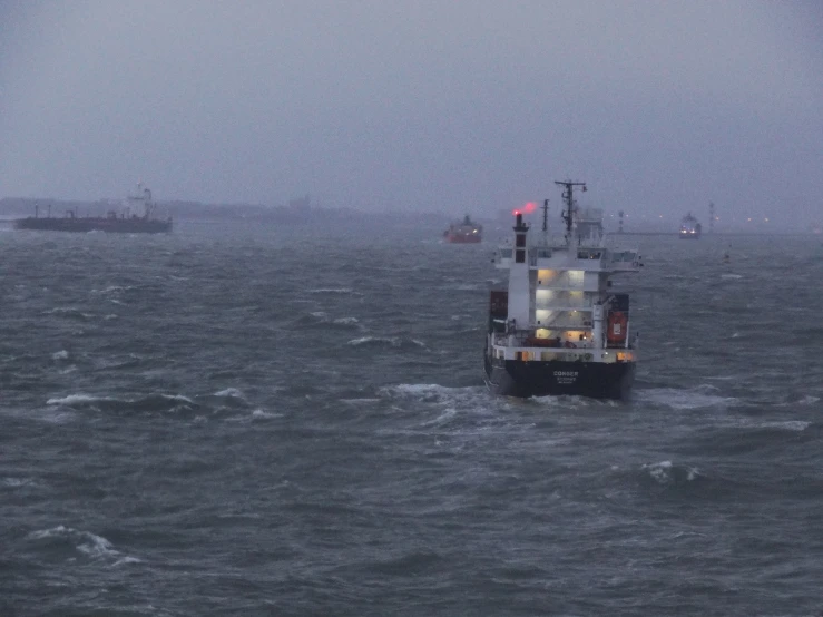 some ships in the water during the day