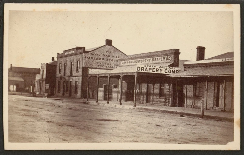 a black and white picture of an old town