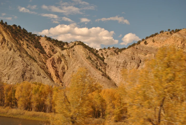 the mountains are covered in fall colors