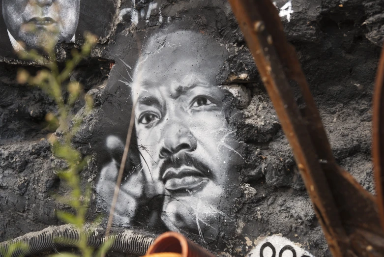 a man on a phone in the midst of a painting