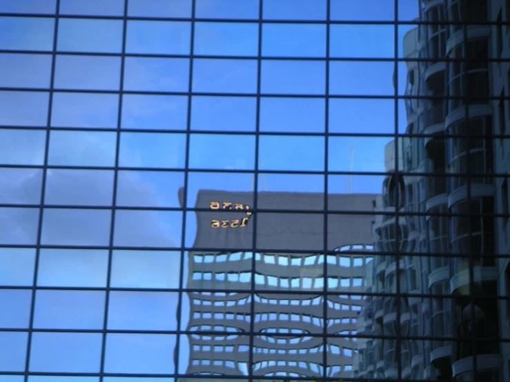 a view of an office building with some reflections on it