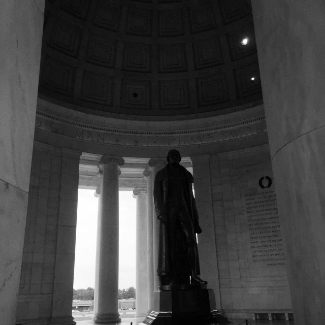 a view of the lincoln memorial through an arch