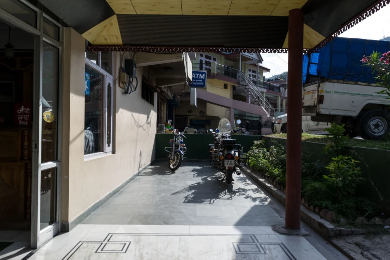 the motorcycles are lined up in front of the house