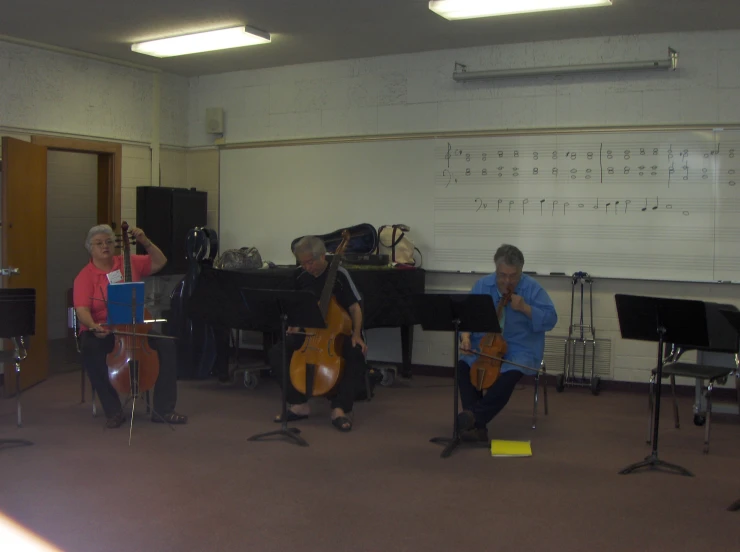 a music group in the middle of a room