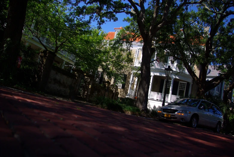 a house with a car parked on the street