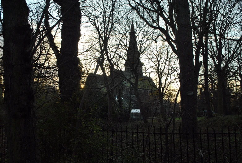 a view of a house through the trees