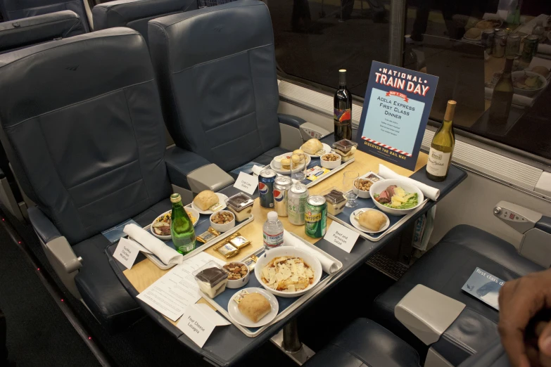 a table set for two, in front of a window