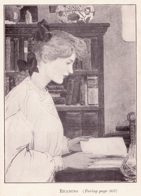 a black and white image of a young woman sitting at a desk