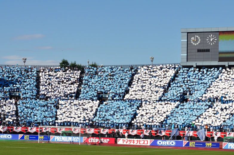 the fans in the stands are waiting for the game to begin