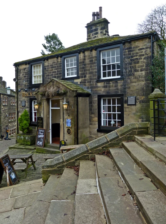 some very old looking houses and stairs leading to them