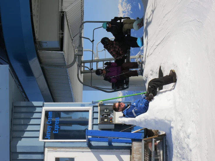 several skiers who are in the snow and skiing