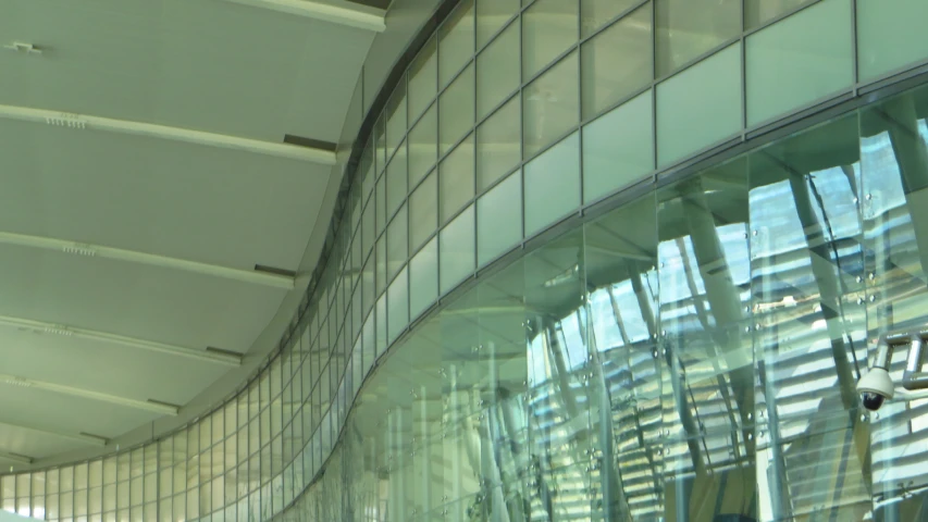 an image of a curved wall and ceiling inside a building