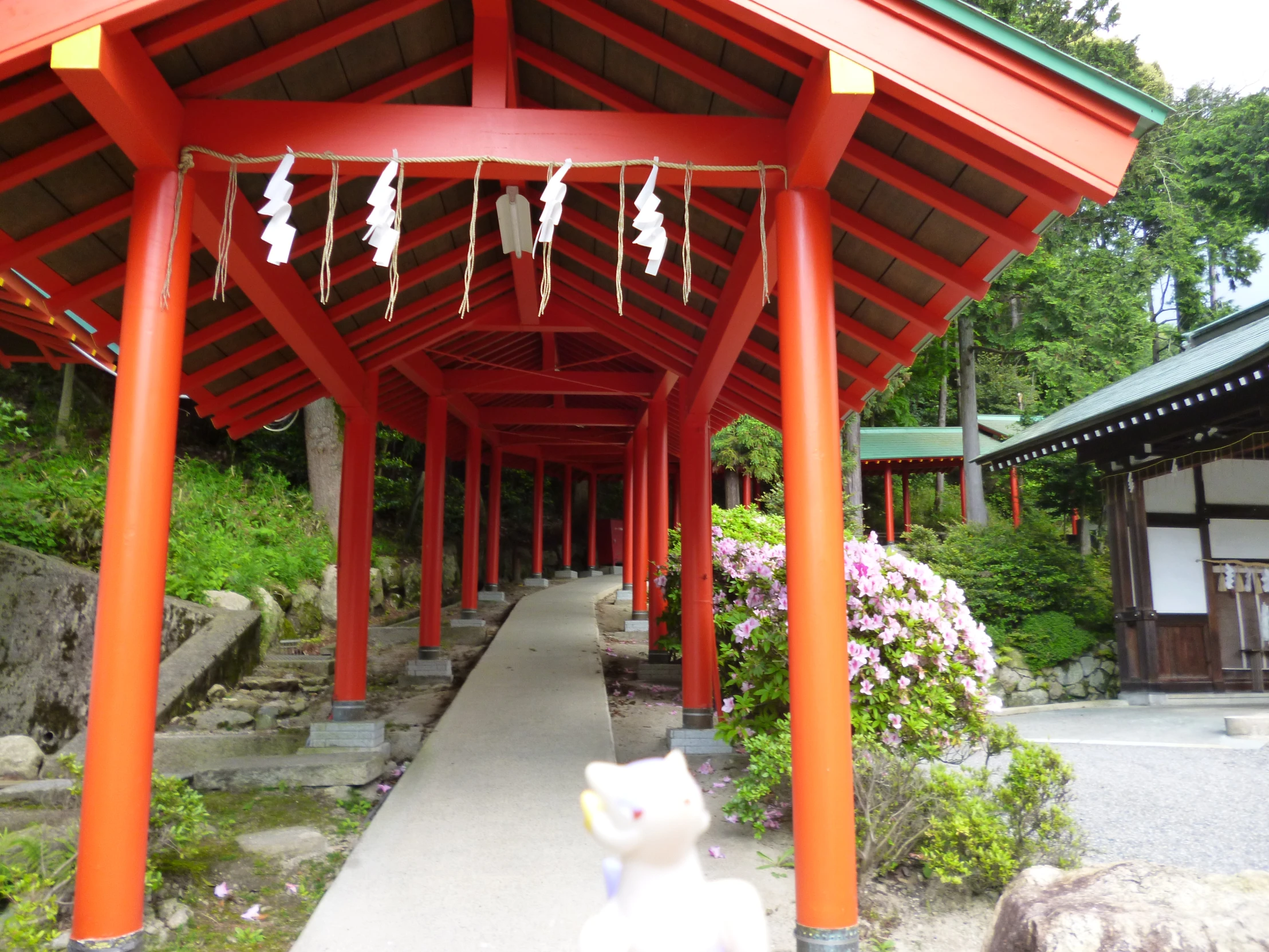 an orange pavilion that is holding stuffed animals