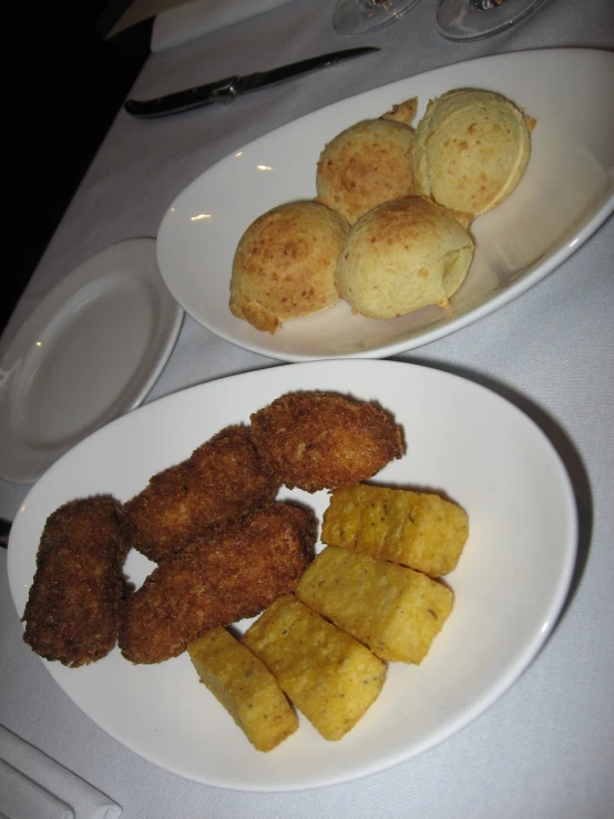 some food that is laying on top of a white plate