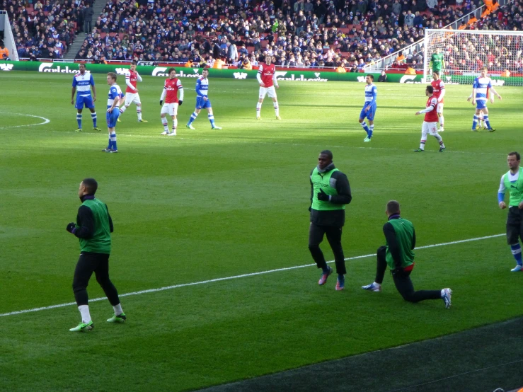 the players are on the field playing soccer