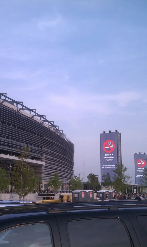 an image of a stadium from behind a car